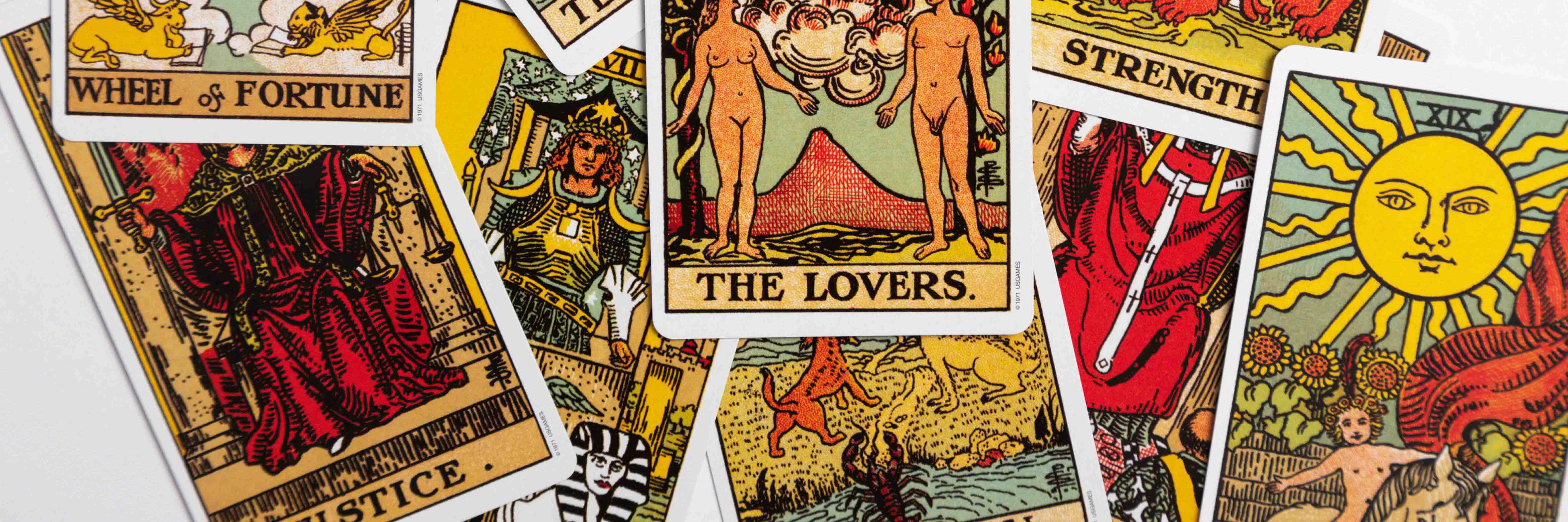 Major arcana cards from the Rider Waite tarot deck in a scrambled layout.