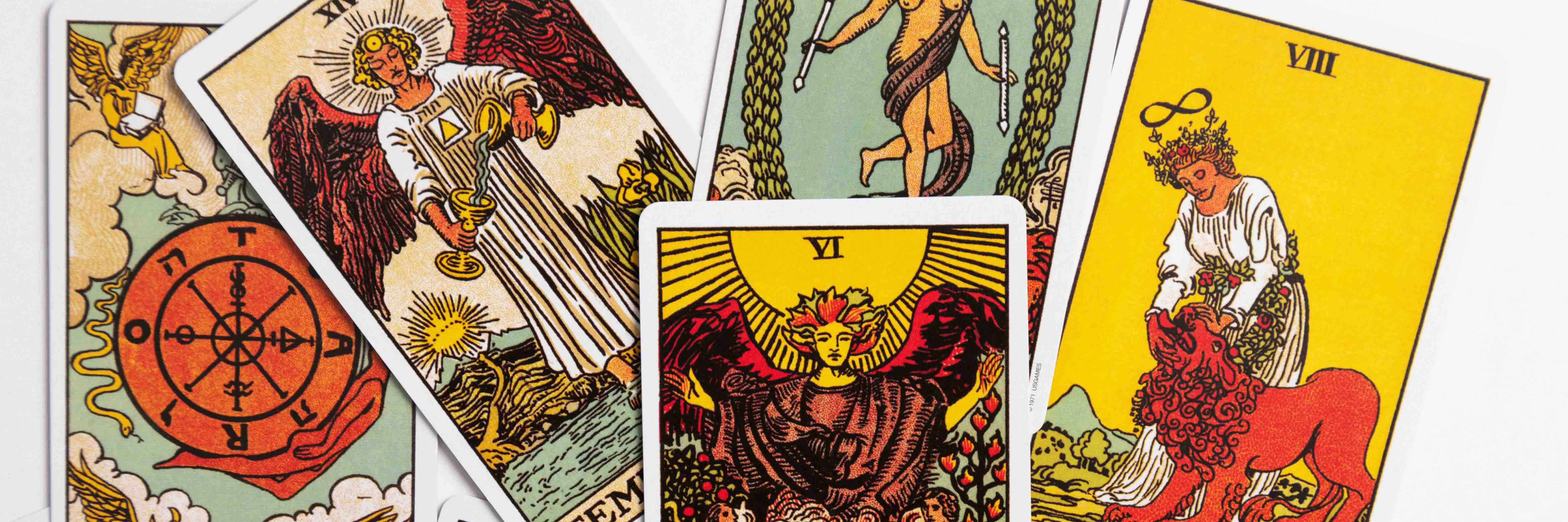 Major arcana cards from the Rider Waite tarot deck in a scrambled layout.